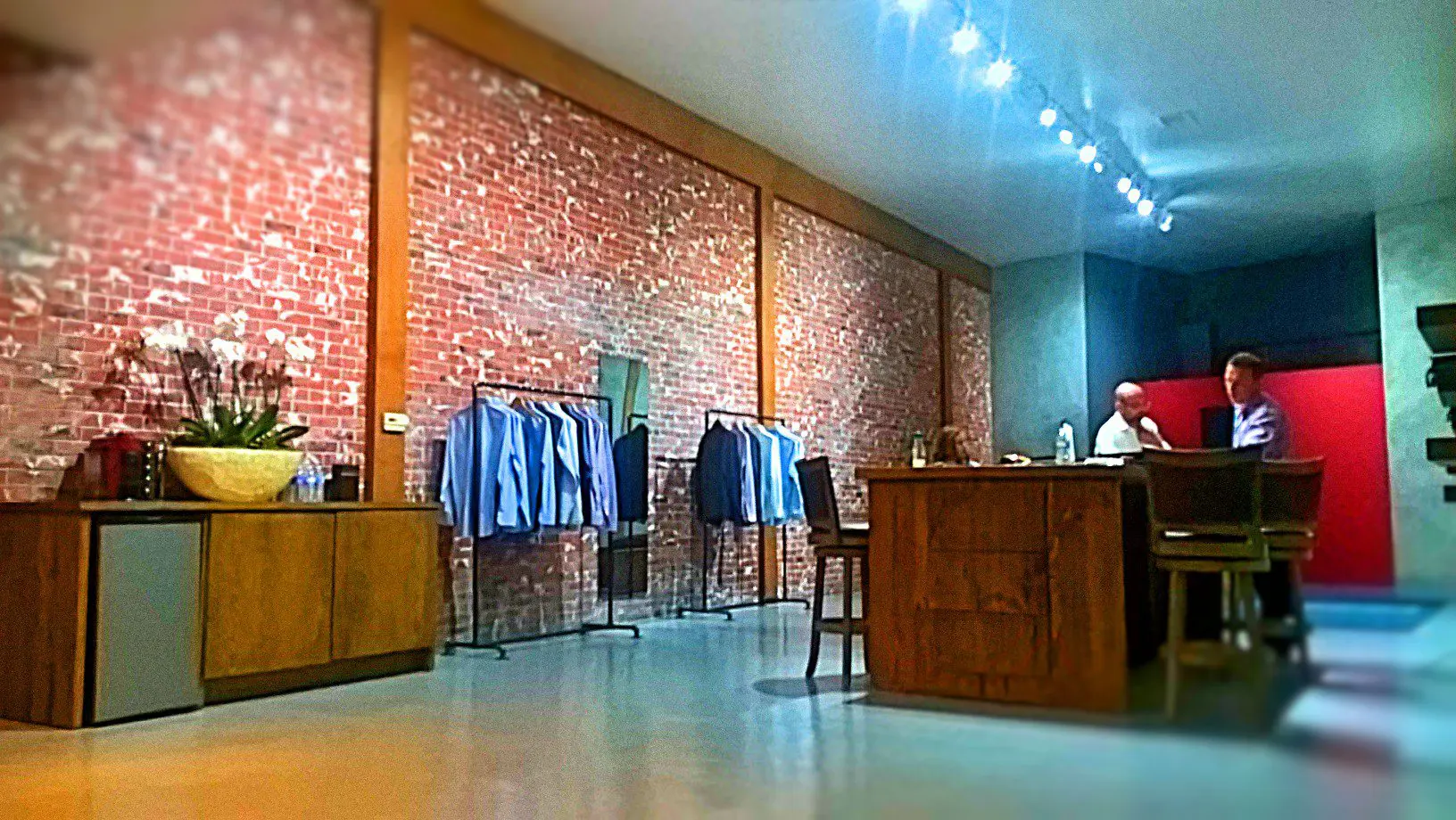 A man standing in front of a counter.